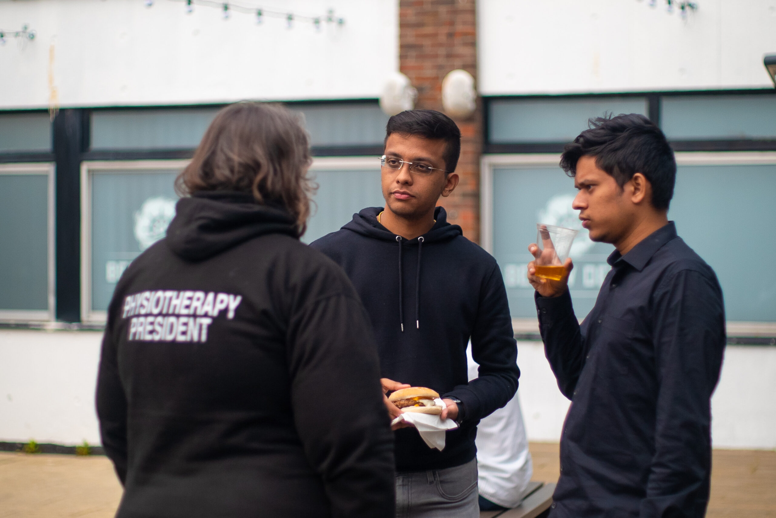 3 course representatives chatting.